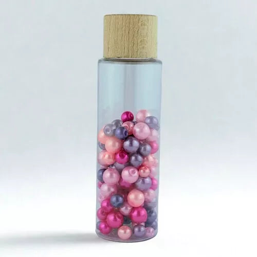 Bouteille sensorielle "Perles enchantées" - Rose